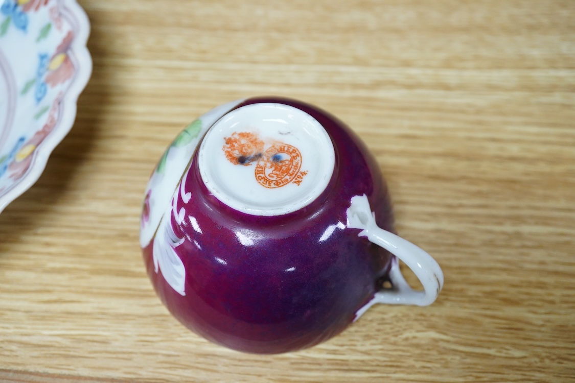 An 18th century Delft plate, two tin-glazed dishes and candlestick, a Gardener Russian porcelain tea cup and saucer, and a mug with liner, largest 22cm in diameter
